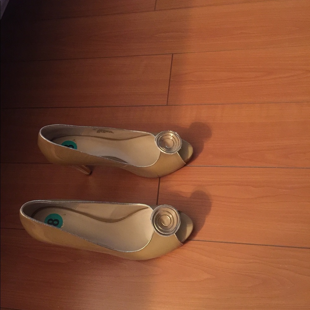 Tan color with golden heels